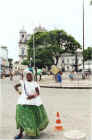 Woman with traditional dress on Terreiro de Jesus square